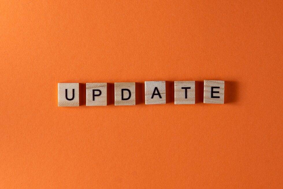 Orange background with the word "Update
